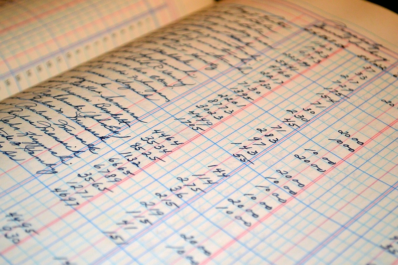Financial records and documents organised on a desk